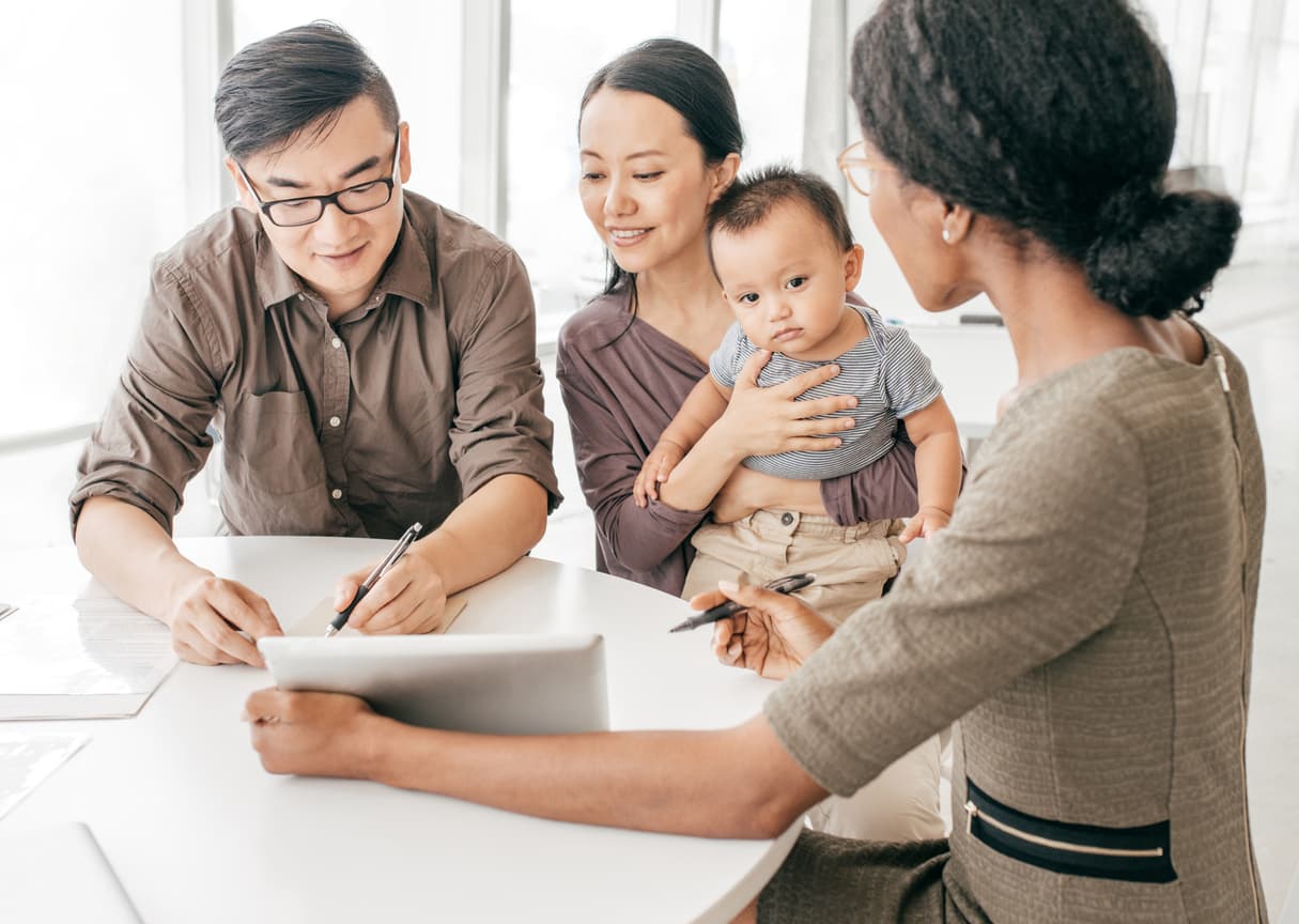 Couple with baby getting advice