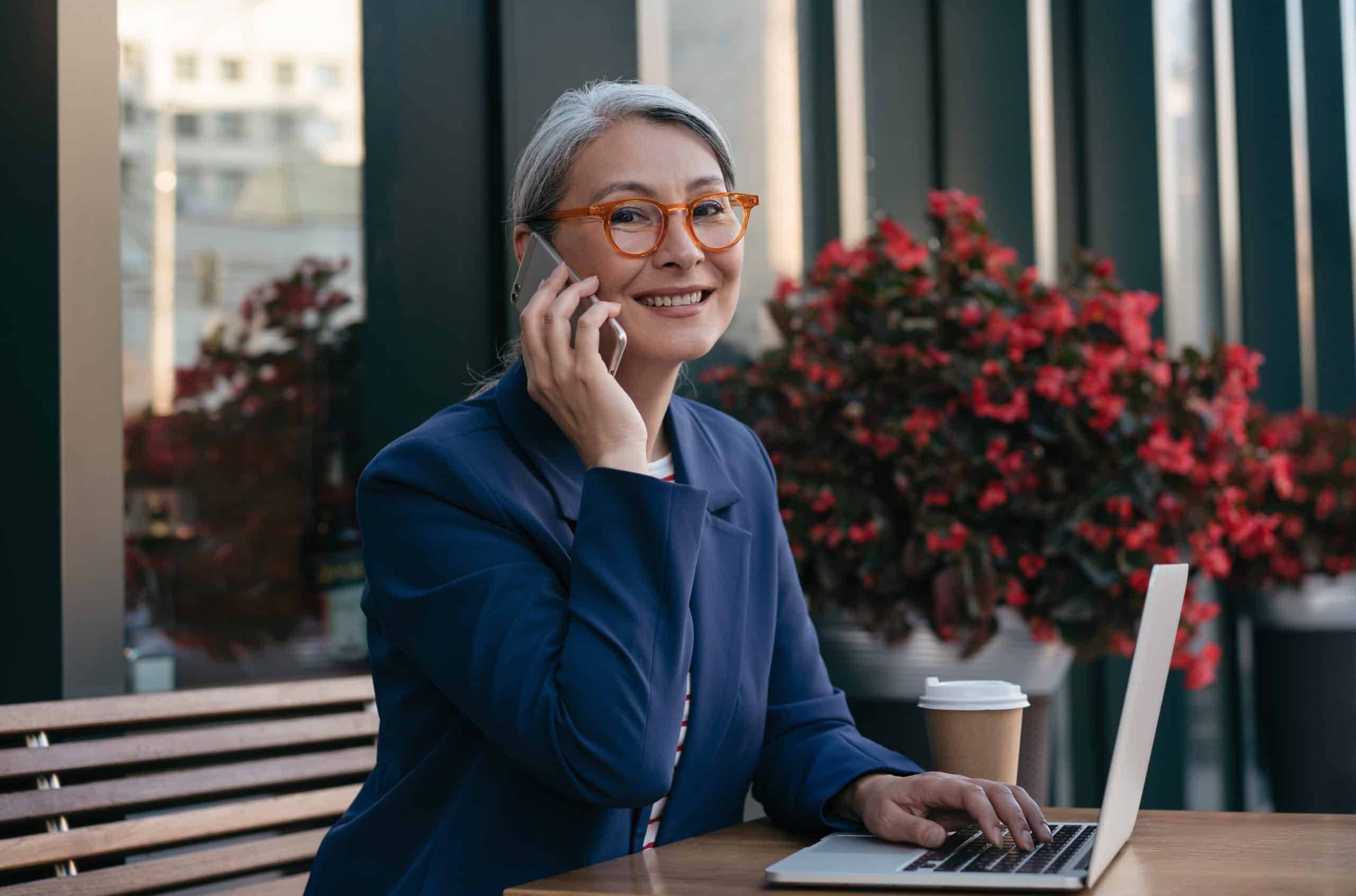 Old woman holding phone