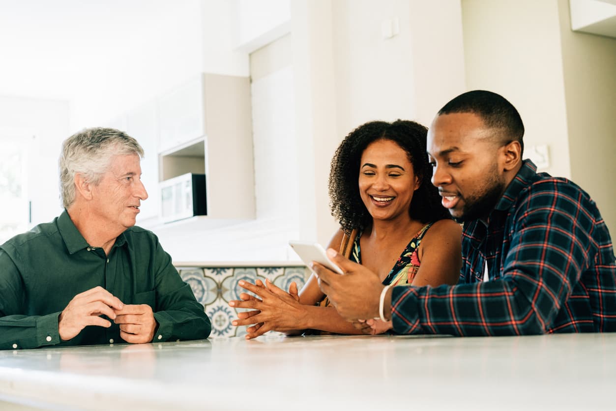 Happy couple signs online contract