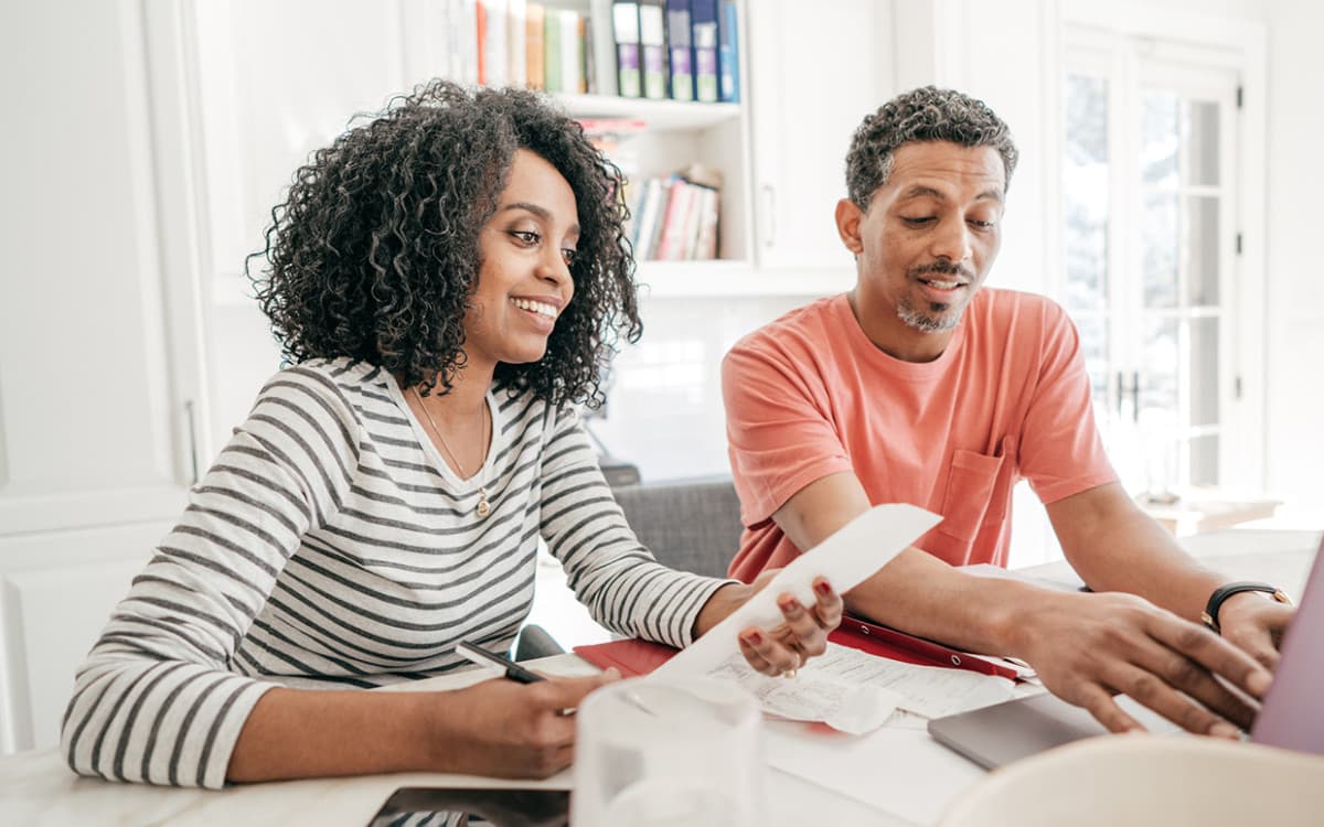 Husband and wife calculating finances